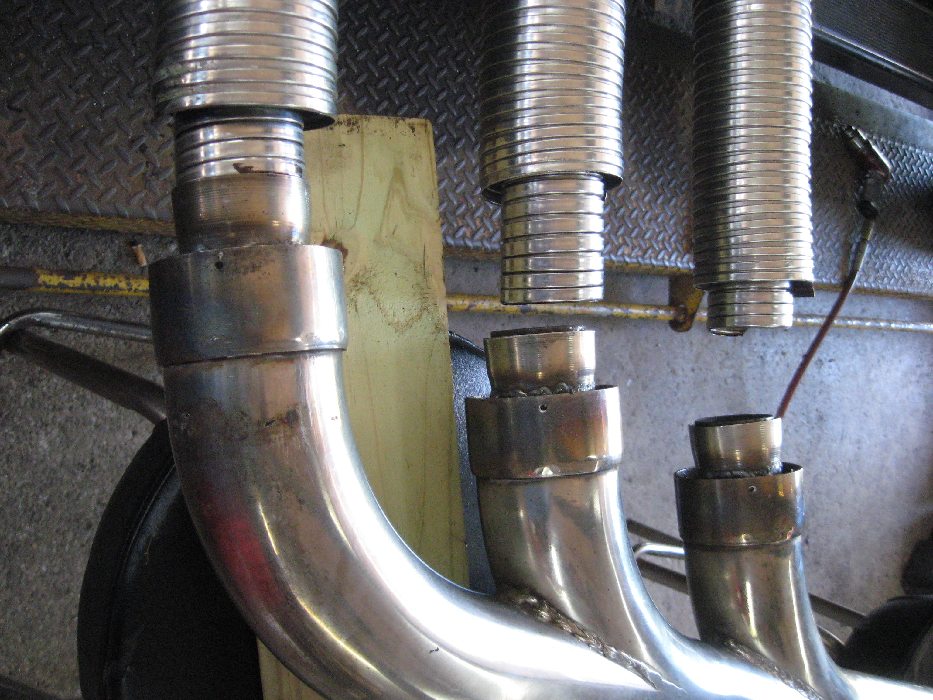 Automotive Exhaust Specialists work